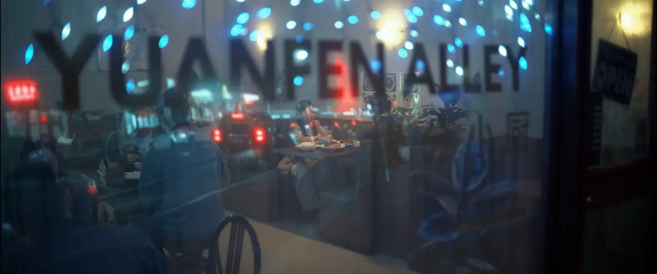 Looking into a Chinese restaurant through the front window, with the words 'Yuanfen Alley' in the foreground.