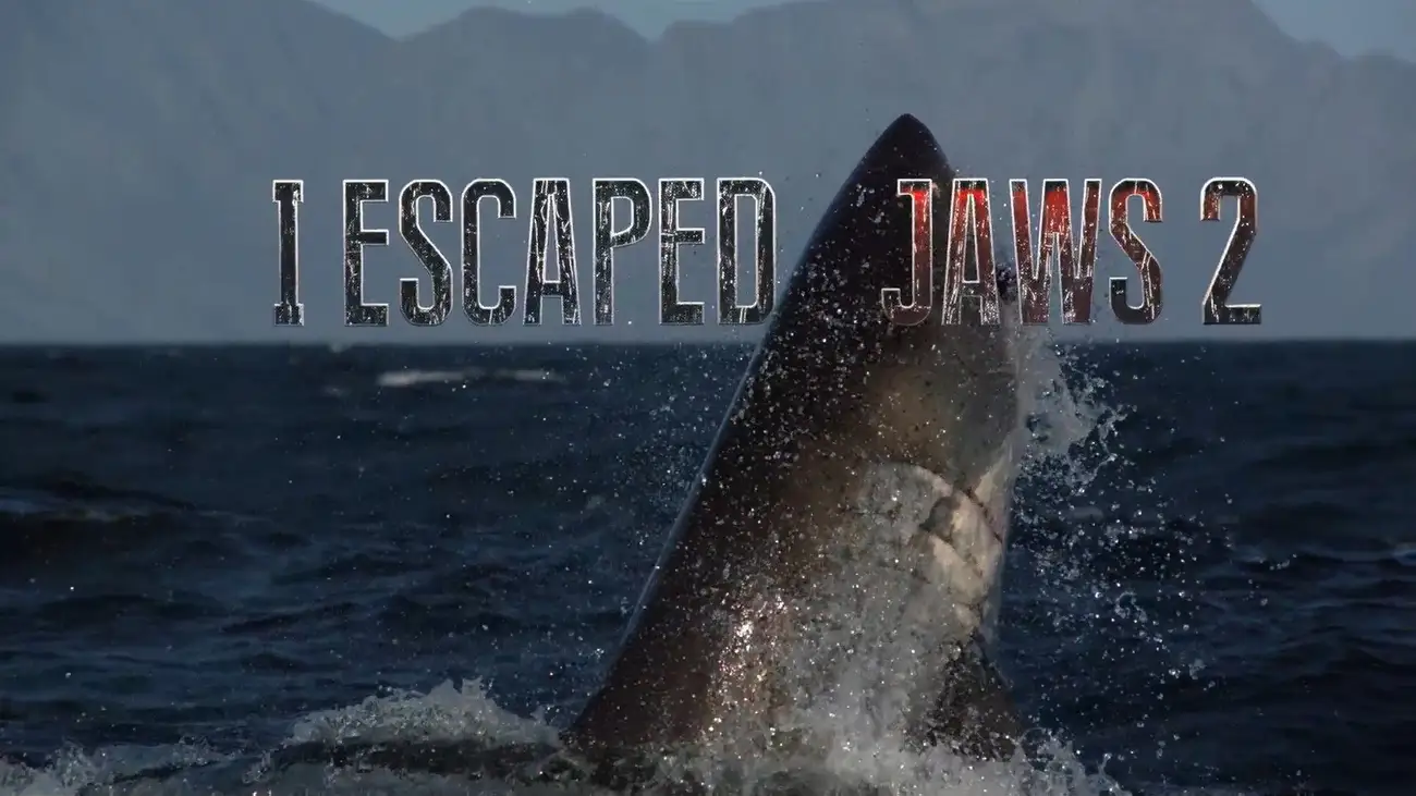 'I Escaped Jaws 2' title graphic featuring a Great White shark leaping out of the ocean.