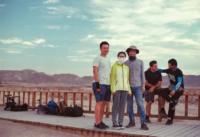 Sound recordist Sunny Yang, CICC producer Wang Xiting, researcher Joshua Cheng, DOP Mike Single and camera assistant Gary Liu at Jiaohe Ancient City Ruins, Xinjiang.
