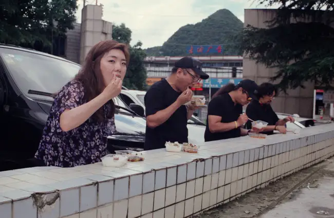 The crew having lunch in a hospital parking lot in Guiyang, Guizhou.