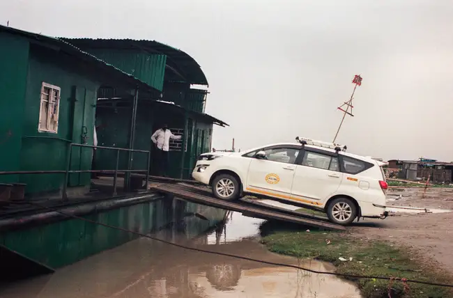 Seems dangerous, but it works. Embarking the ferry across the Brahmaputra River in Assam.