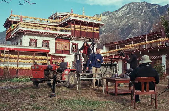 The crew set up for a cooking scene in front of a guest house in Zhonglu Village, Sichuan.