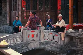 Tunpu women just hanging out at Tianlong, Guizhou.