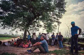 Having a tea break under the shade in Assam, India.