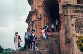 Suphy and I pose on the stairs to the top floor of Rang Ghar.