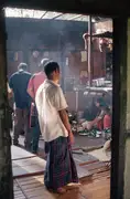 Rajesh, a Singpho Village local, prepares a meal for us.