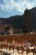 Corn cobs dry quickly on the rooftop balconies under the harsh mountain sun.