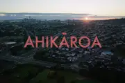 'Ahikāroa' title graphic against the Auckland skyline.