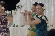 Hibiscus dances at a wedding in 'Hibiscus & Ruthless'.